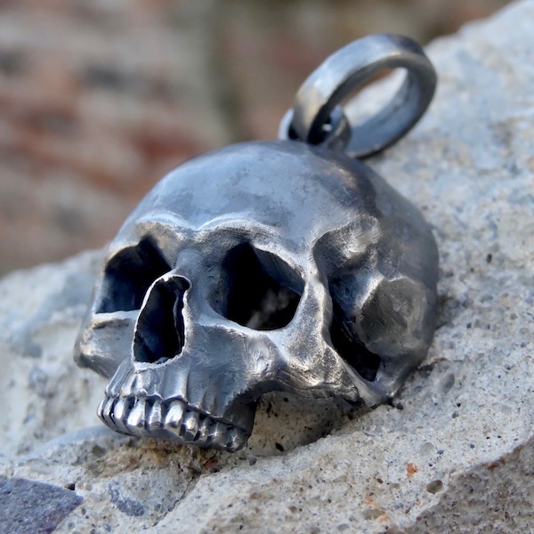 Sterling silver skull on sale pendant